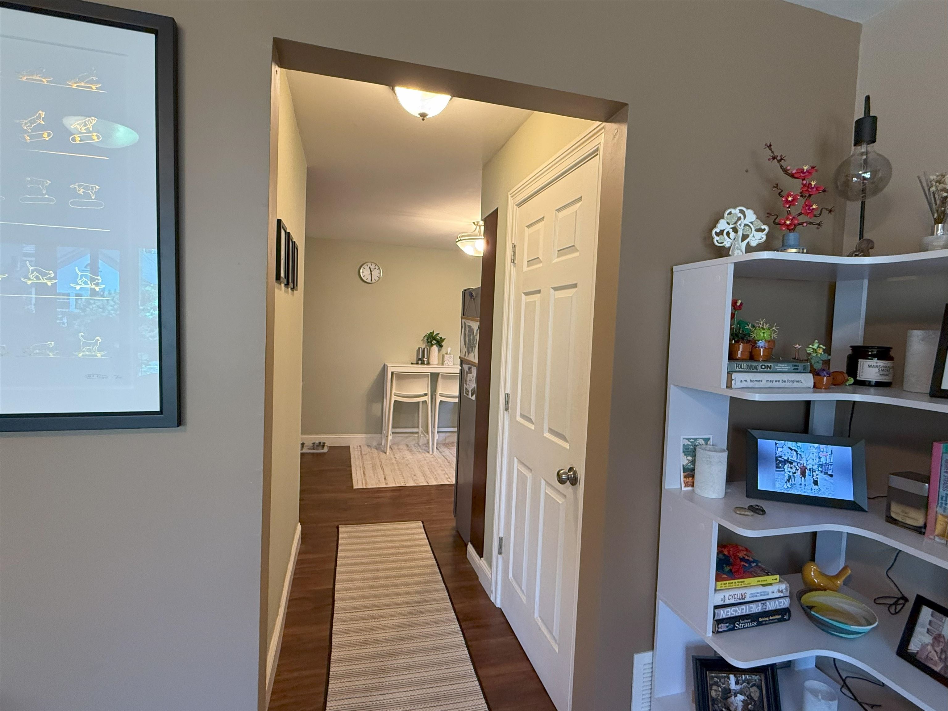 45 Garfield Place, Unit 1 (1ST FLOOR) Ridgewood, NJ 07450 - Photo 5 of 33 a view of a hallway to room with wooden floor and closet