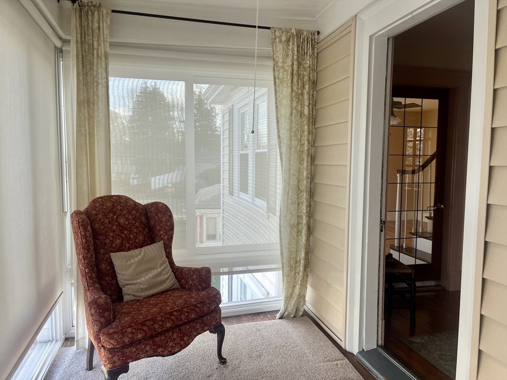 11 Sumner Road Salem, MA 01970 - Photo 11 of 37 a living room with a couch and a window