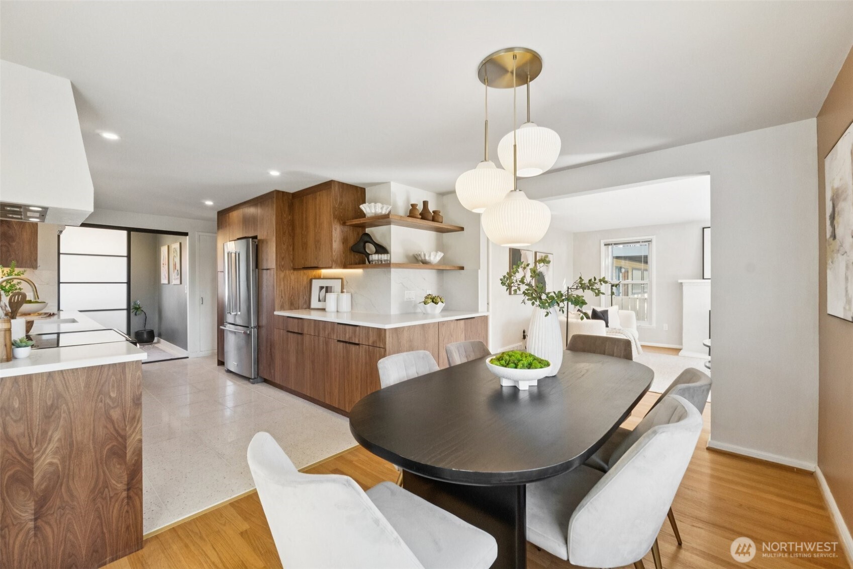 730 Northwest 73rd Street Seattle, WA 98117 - Photo 11 of 39 a view of a dining room with furniture and wooden floor