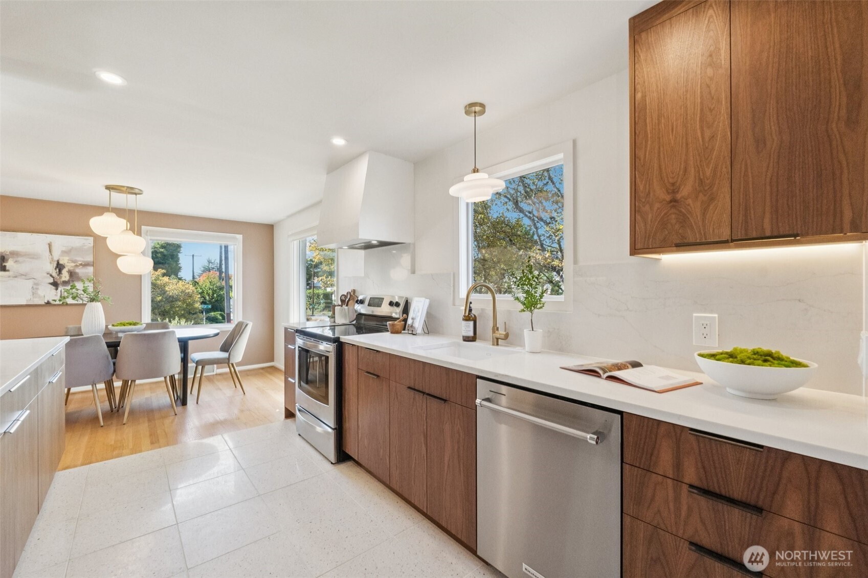 730 Northwest 73rd Street Seattle, WA 98117 - Photo 16 of 39 a kitchen with a sink cabinets and window