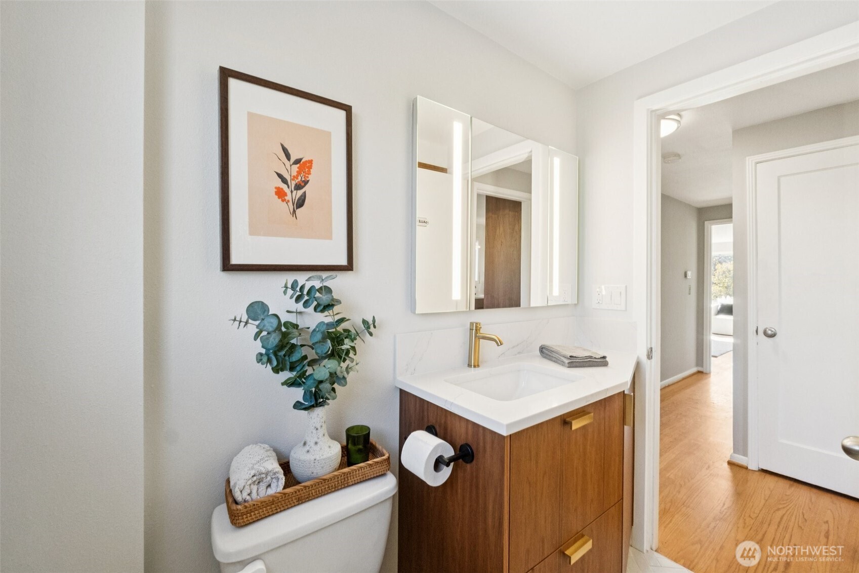 730 Northwest 73rd Street Seattle, WA 98117 - Photo 20 of 39 a bathroom with a sink and a mirror