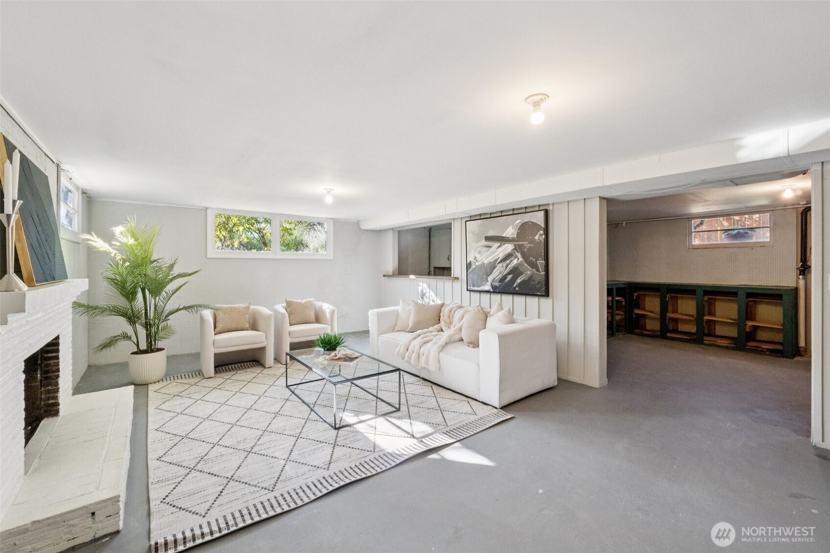 730 Northwest 73rd Street Seattle, WA 98117 - Photo 27 of 39 a living room with furniture and a table