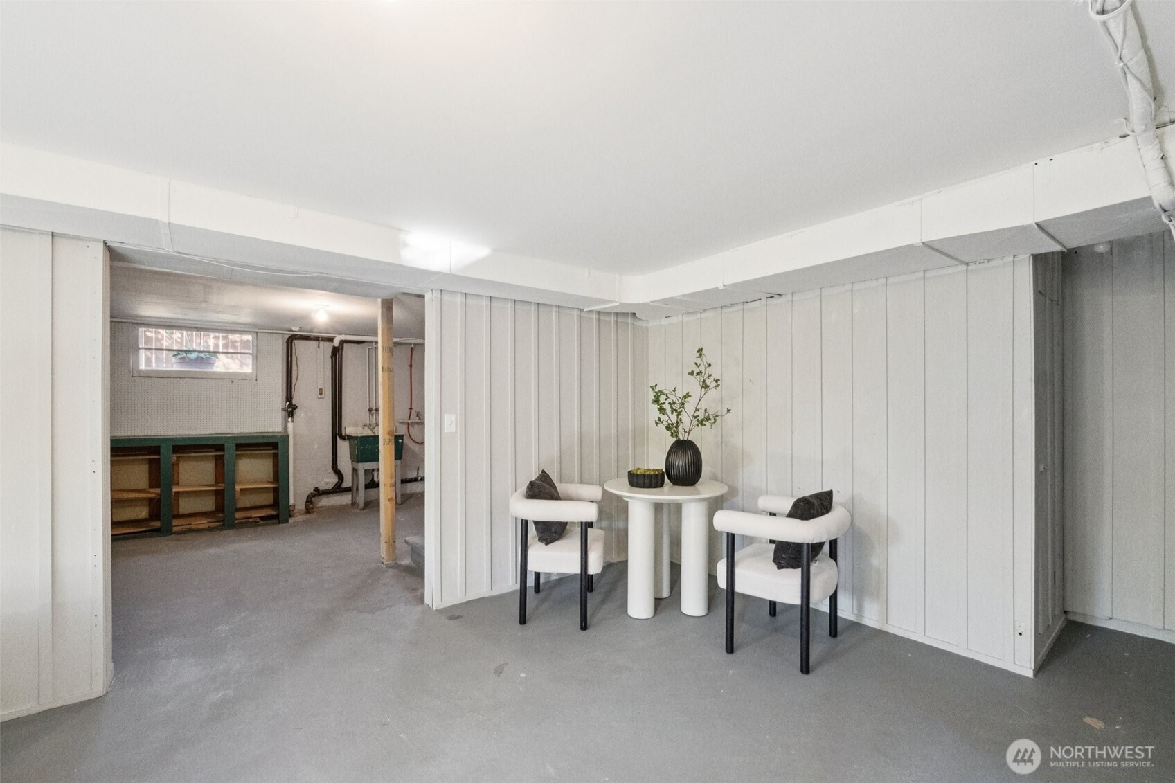 730 Northwest 73rd Street Seattle, WA 98117 - Photo 28 of 39 a view of a livingroom with furniture and a window