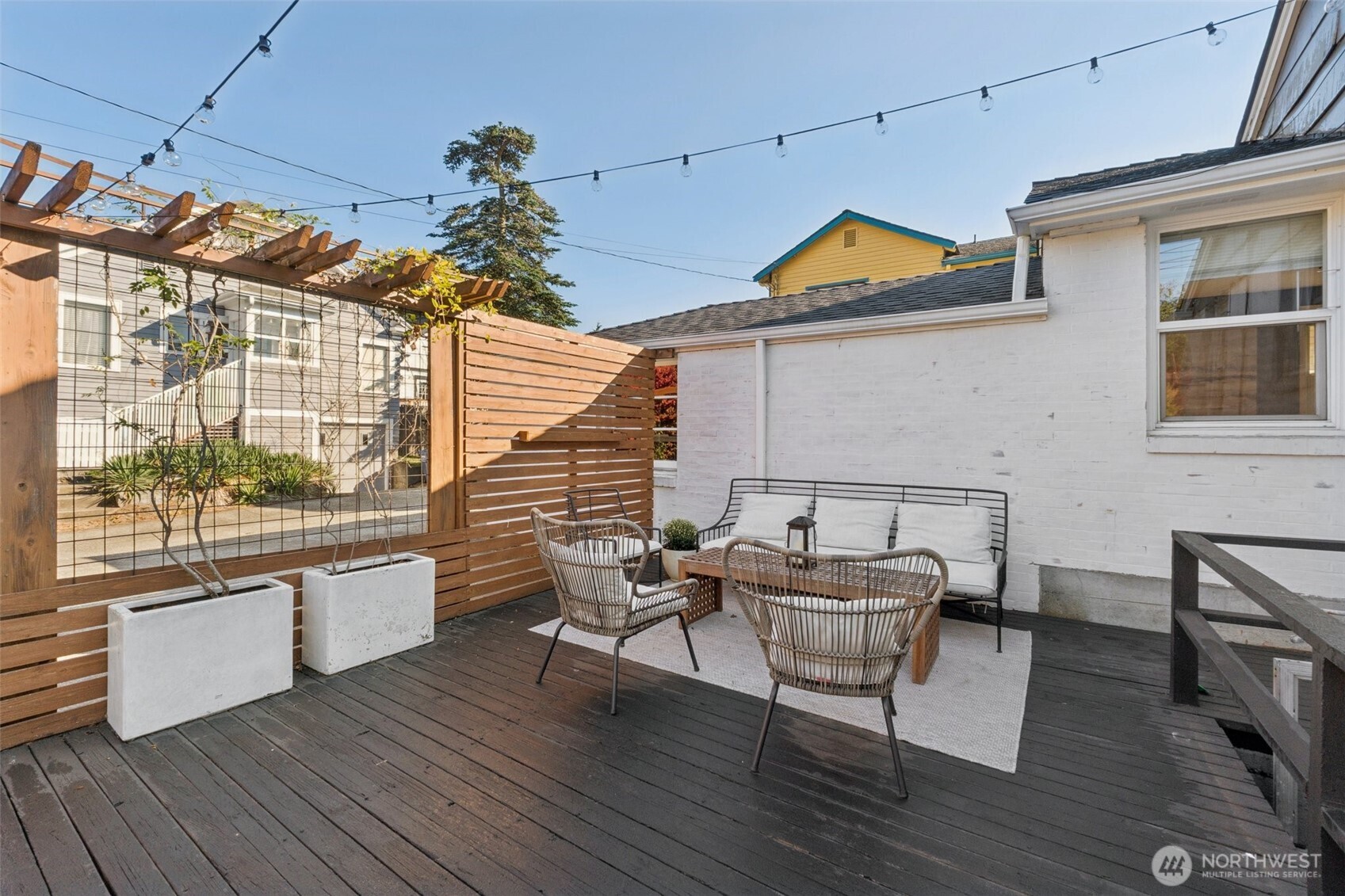 730 Northwest 73rd Street Seattle, WA 98117 - Photo 34 of 39 a view of a dining room with furniture and wooden floor