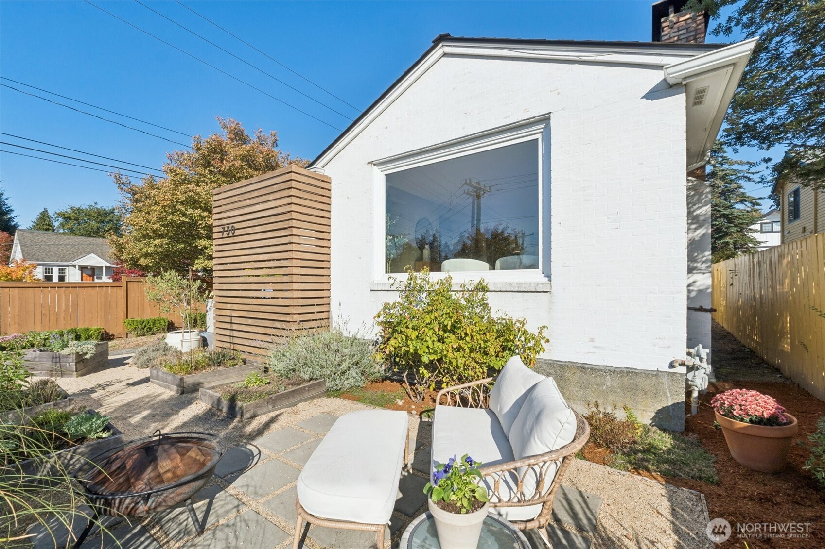 730 Northwest 73rd Street Seattle, WA 98117 - Photo 5 of 39 a house view with a seating space