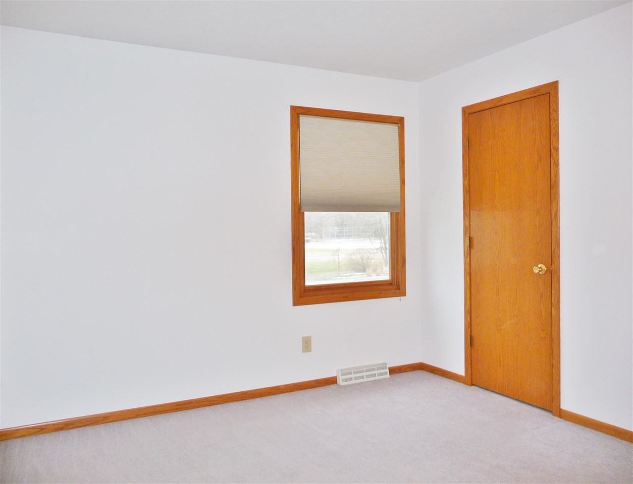 4349 Waltham Road Roscoe, IL 61073 - Photo 17 of 27 an empty room with a window