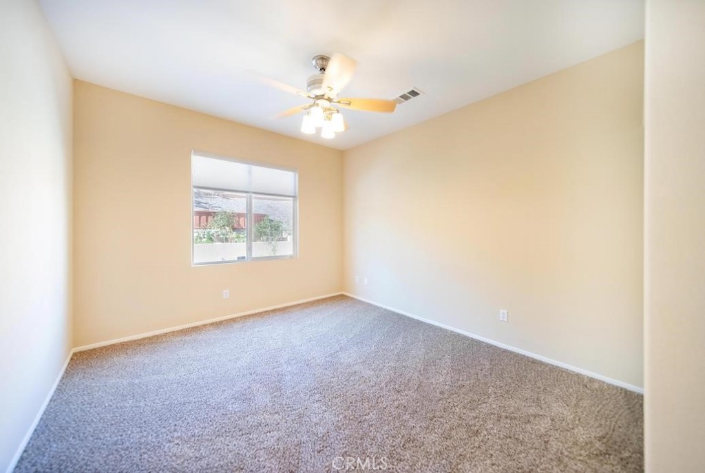 29063 Boulder Crest Way Menifee, CA 92584 - Photo 17 of 40 Downstairs large bedroom