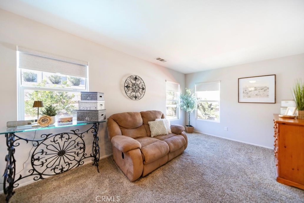 29063 Boulder Crest Way Menifee, CA 92584 - Photo 30 of 40 Sitting area in primary bedroom