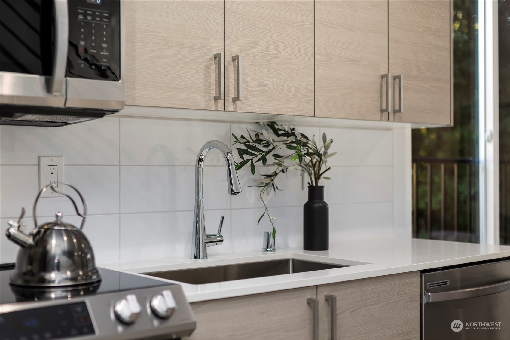 3102 South Walden Street Seattle, WA 98144 - Photo 13 of 35 a sink with a potted plant on it