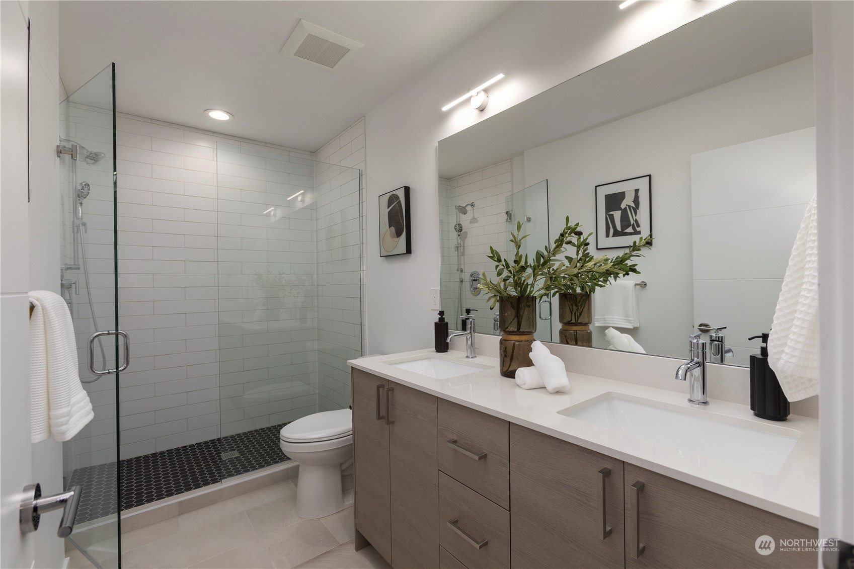 3102 South Walden Street Seattle, WA 98144 - Photo 23 of 35 a bathroom with a sink a toilet and shower