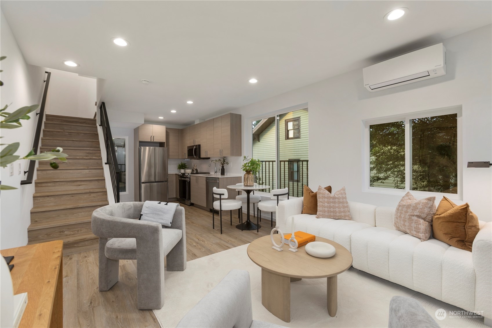 3102 South Walden Street Seattle, WA 98144 - Photo 6 of 35 a living room with furniture and a large window
