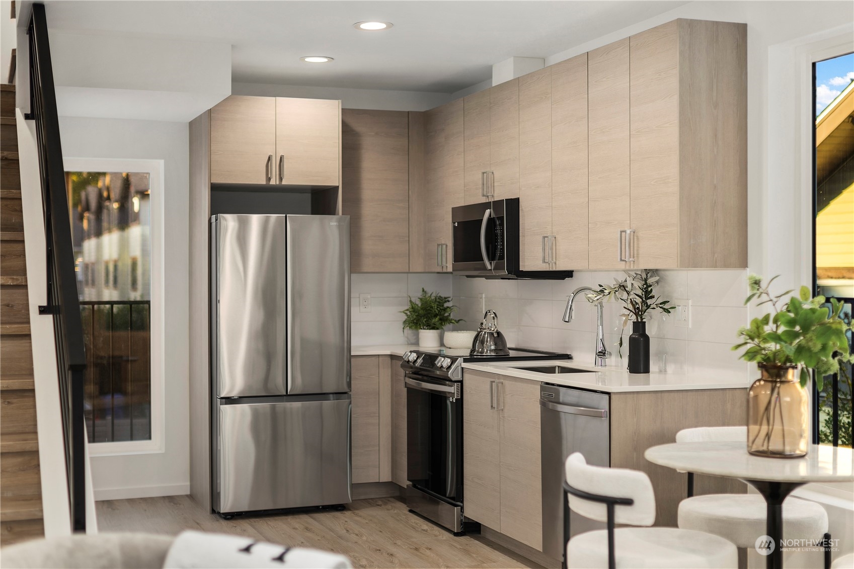 3102 South Walden Street Seattle, WA 98144 - Photo 9 of 35 a kitchen with a refrigerator and a sink