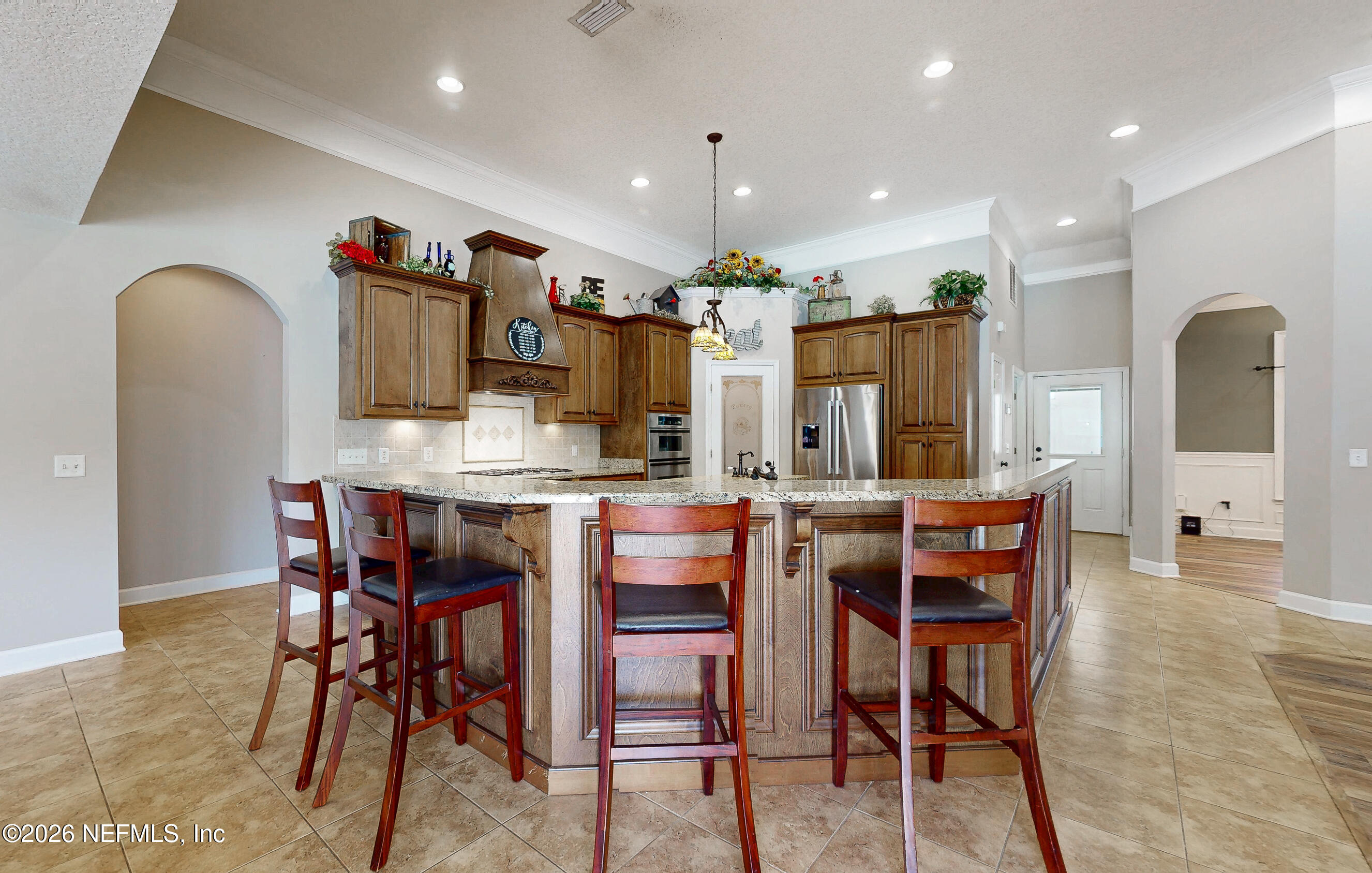 391595 Prospect Landing Hilliard, FL 32046 - Photo 16 of 69 Kitchen Breakfast Bar