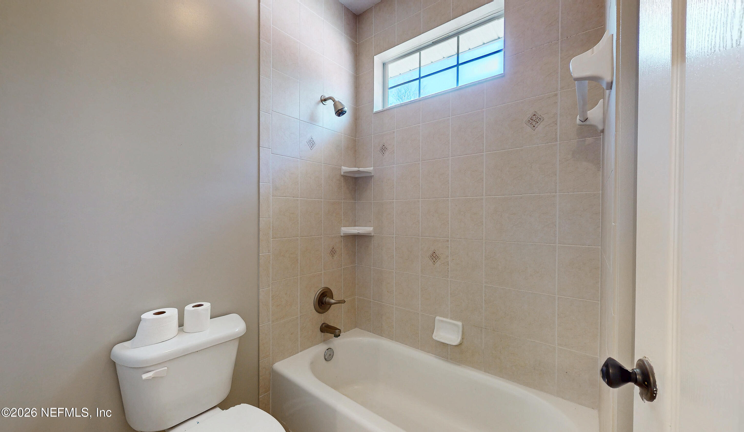 391595 Prospect Landing Hilliard, FL 32046 - Photo 36 of 69 a white toilet sitting next to a bath tub