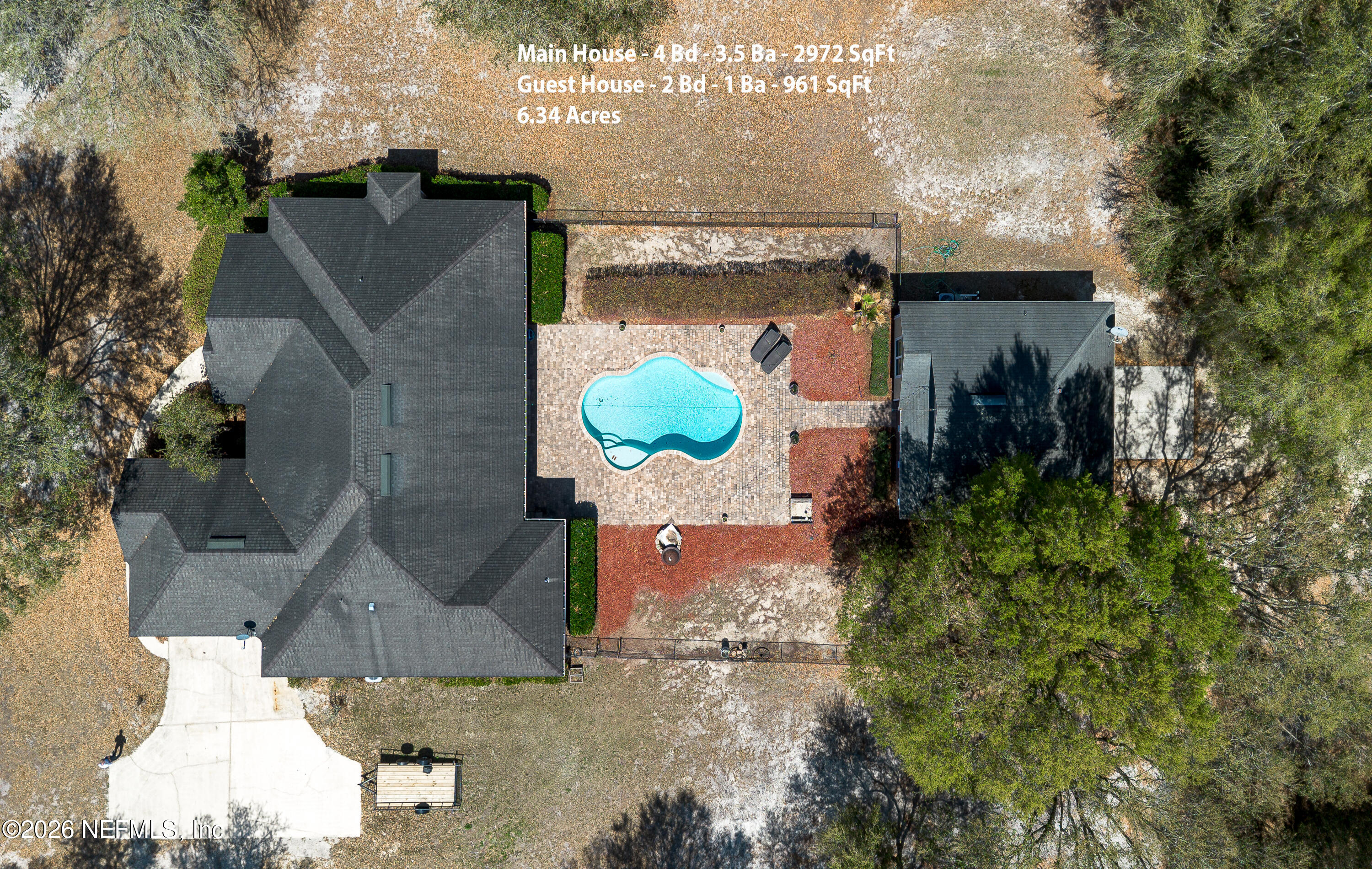 391595 Prospect Landing Hilliard, FL 32046 - Photo 6 of 69 an aerial view of a house with a swimming pool
