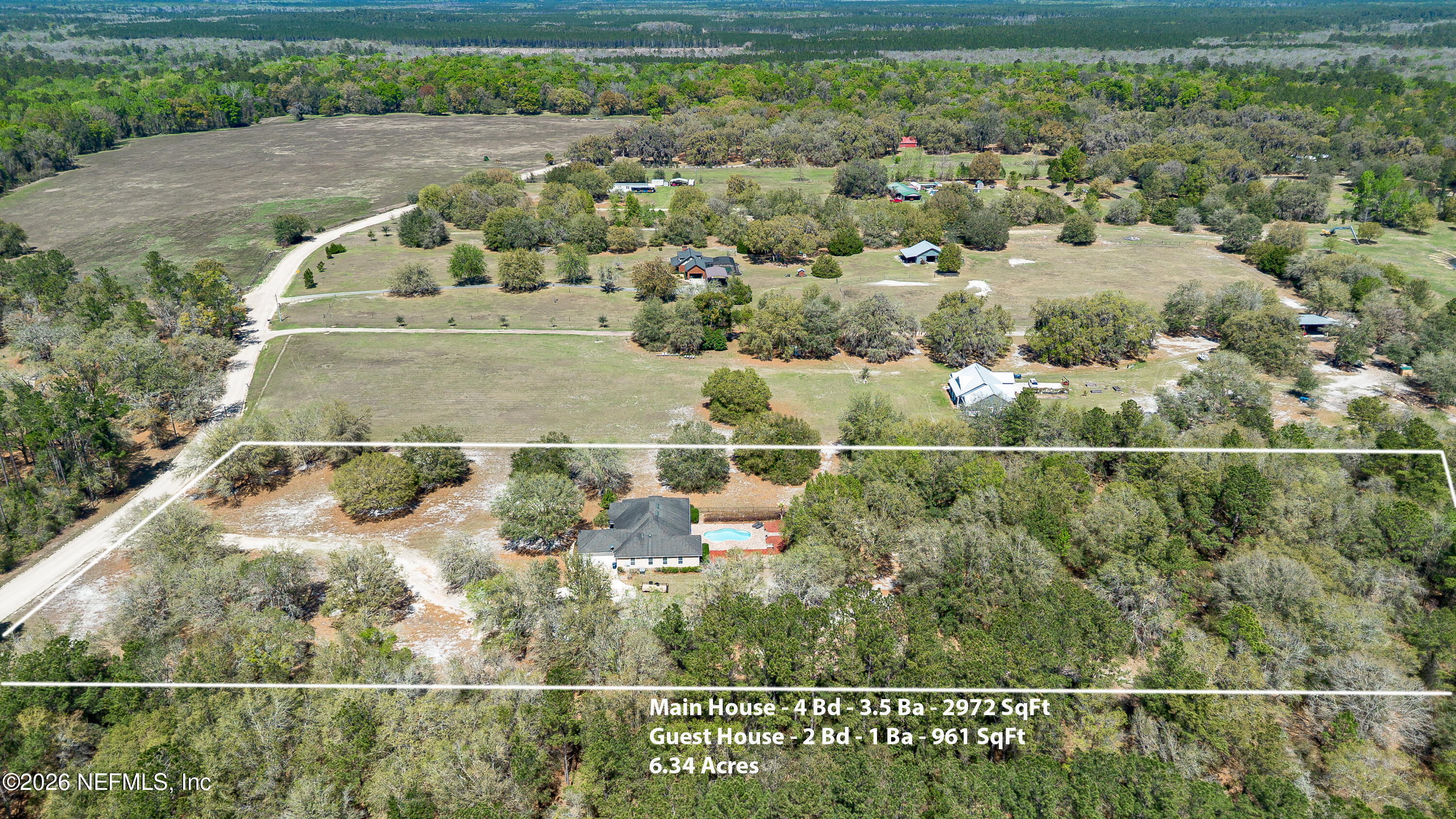 391595 Prospect Landing Hilliard, FL 32046 - Photo 68 of 69 an aerial view of residential houses with outdoor space