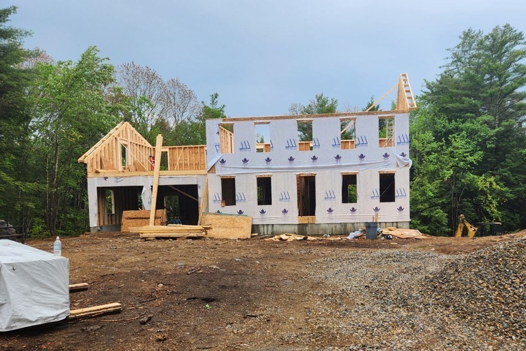142 New Westminster Road Hubbardston, MA 01452 - Photo 7 of 7 a view of a white house with large trees and outdoor space