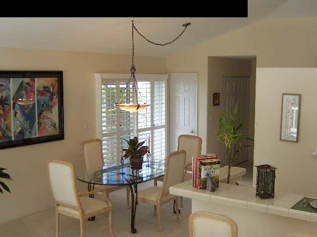 2811 Liholani Street, Unit 4 Pukalani, HI 96768 - Photo 12 of 22 a dining room with furniture and window
