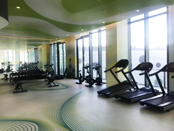 a view of a room with gym equipment