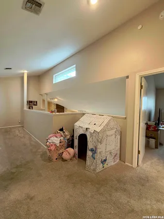 a bed room with a bed and a couch
