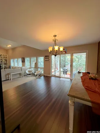 a room with lots of counter space and a wooden floor