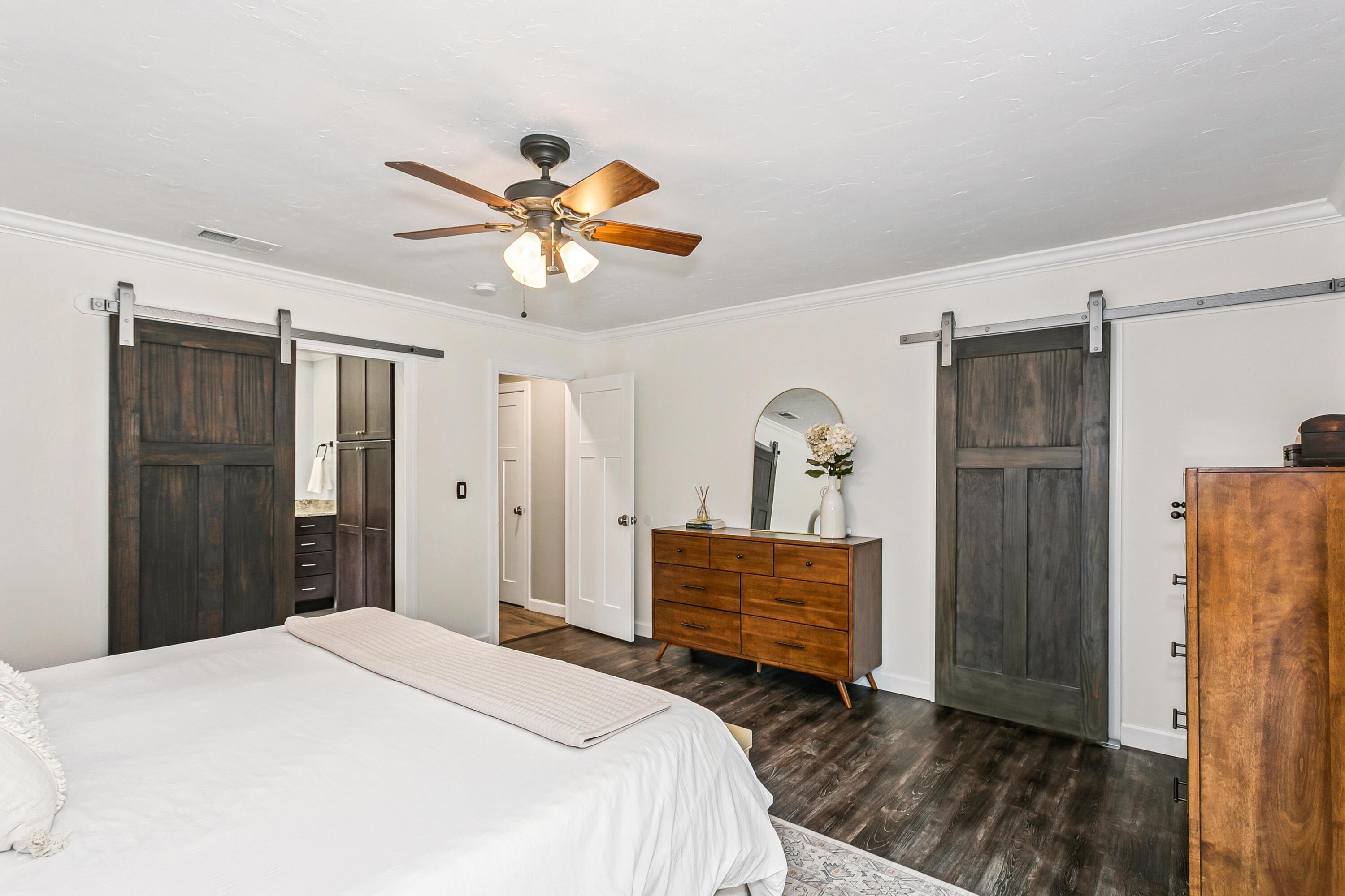 76 Country Club Road Shalimar, FL 32579 - Photo 16 of 47 a bedroom with a bed dresser and a window