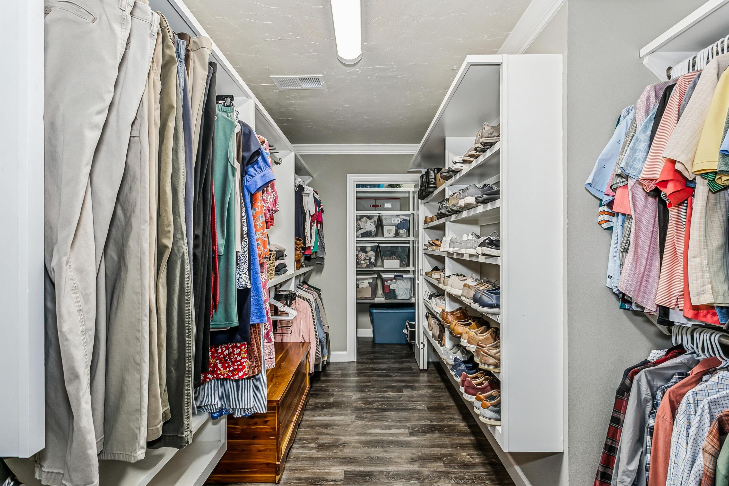 76 Country Club Road Shalimar, FL 32579 - Photo 20 of 47 a view of walk in closet with clothes