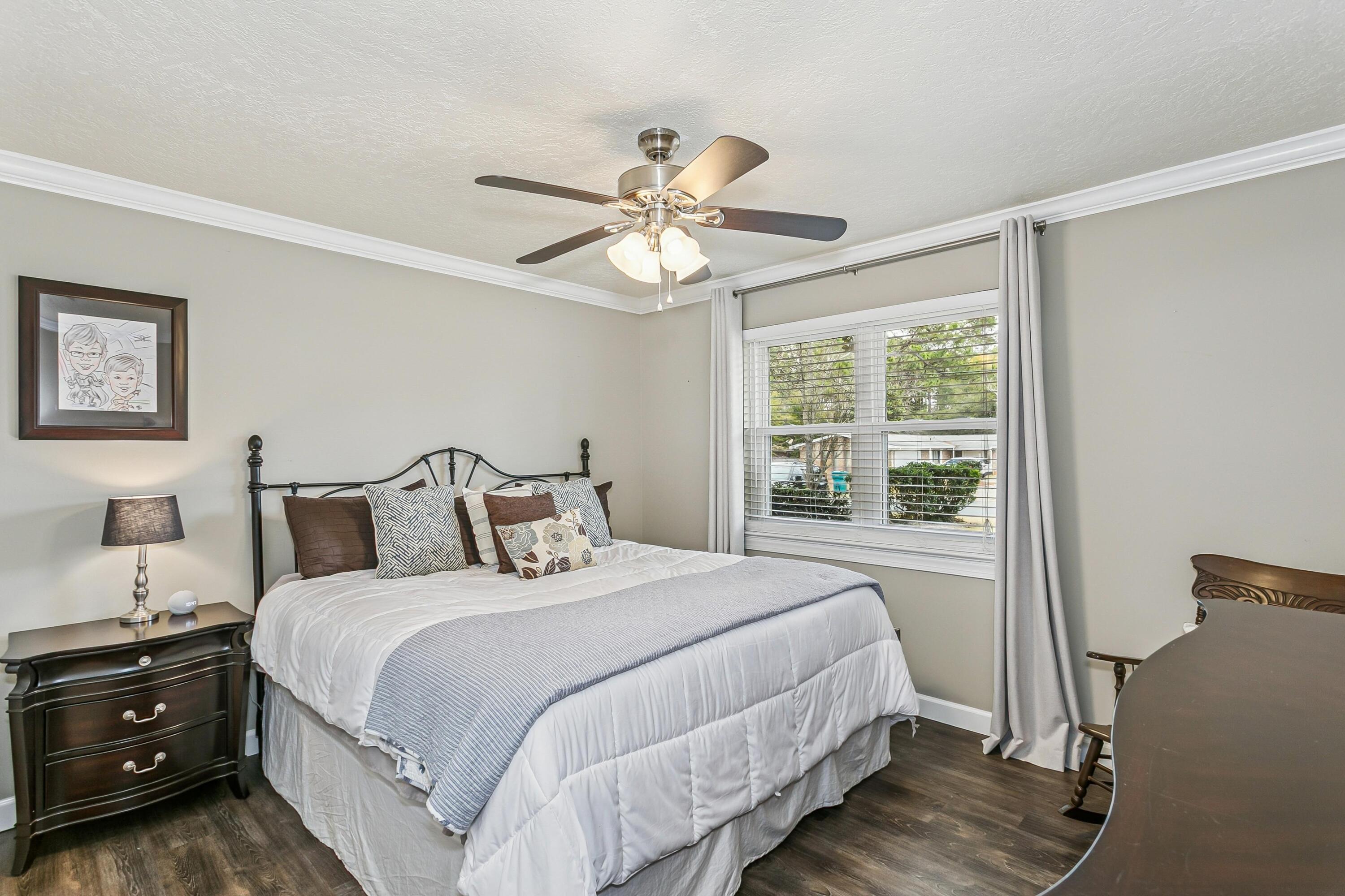 76 Country Club Road Shalimar, FL 32579 - Photo 23 of 47 a bedroom with bed and a window