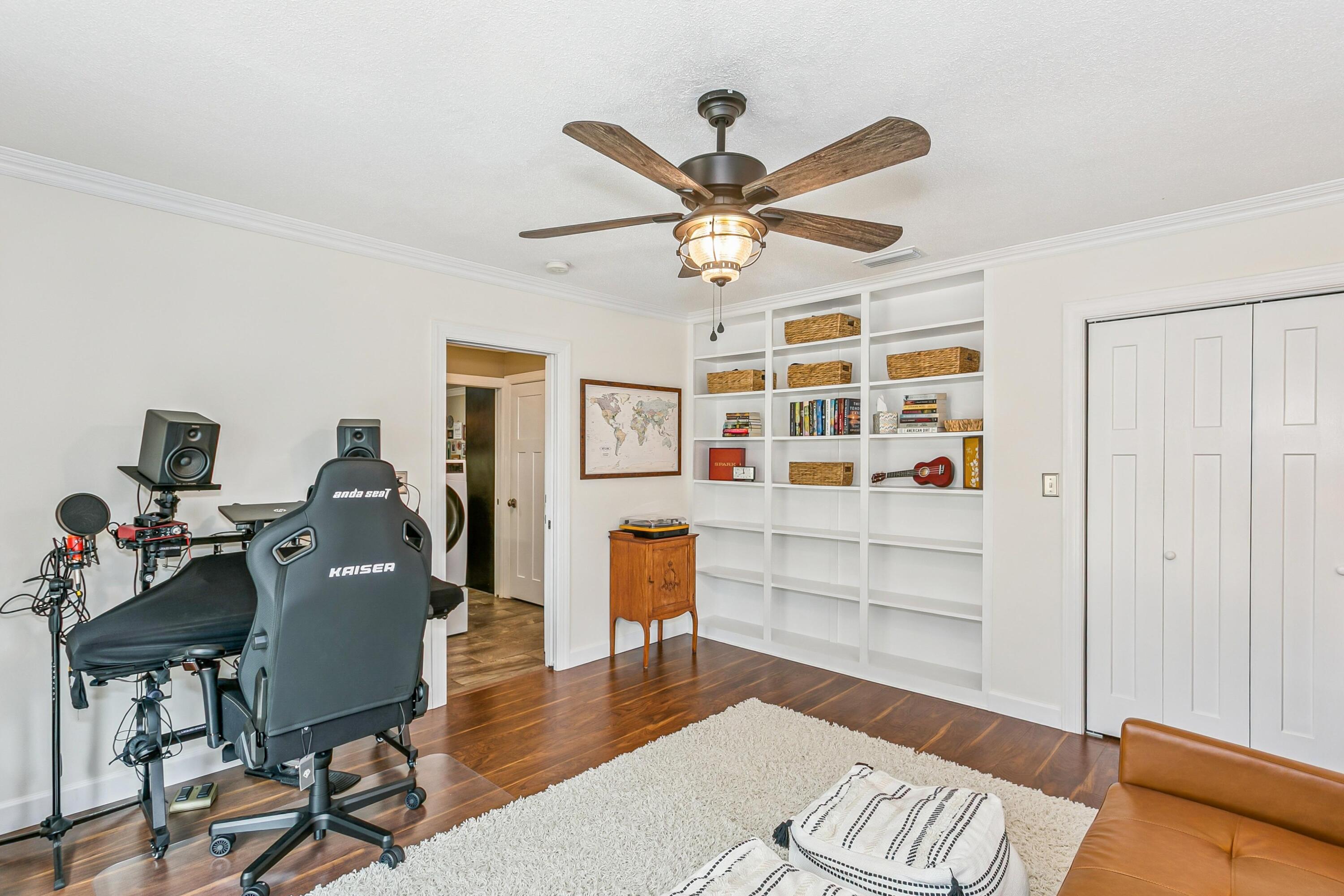 76 Country Club Road Shalimar, FL 32579 - Photo 29 of 47 a living room with furniture and a window