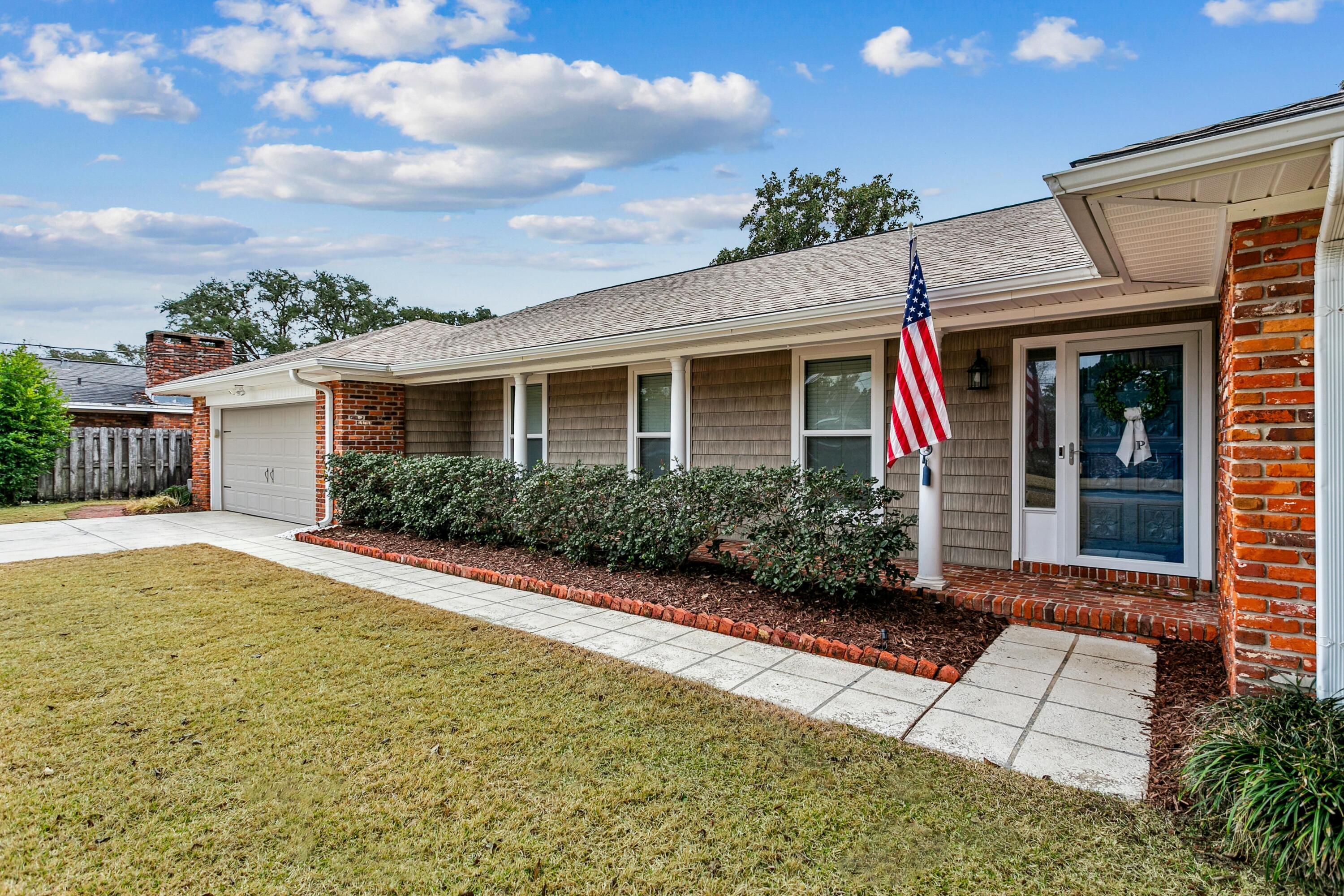 76 Country Club Road Shalimar, FL 32579 - Photo 42 of 47 a view of house with a yard