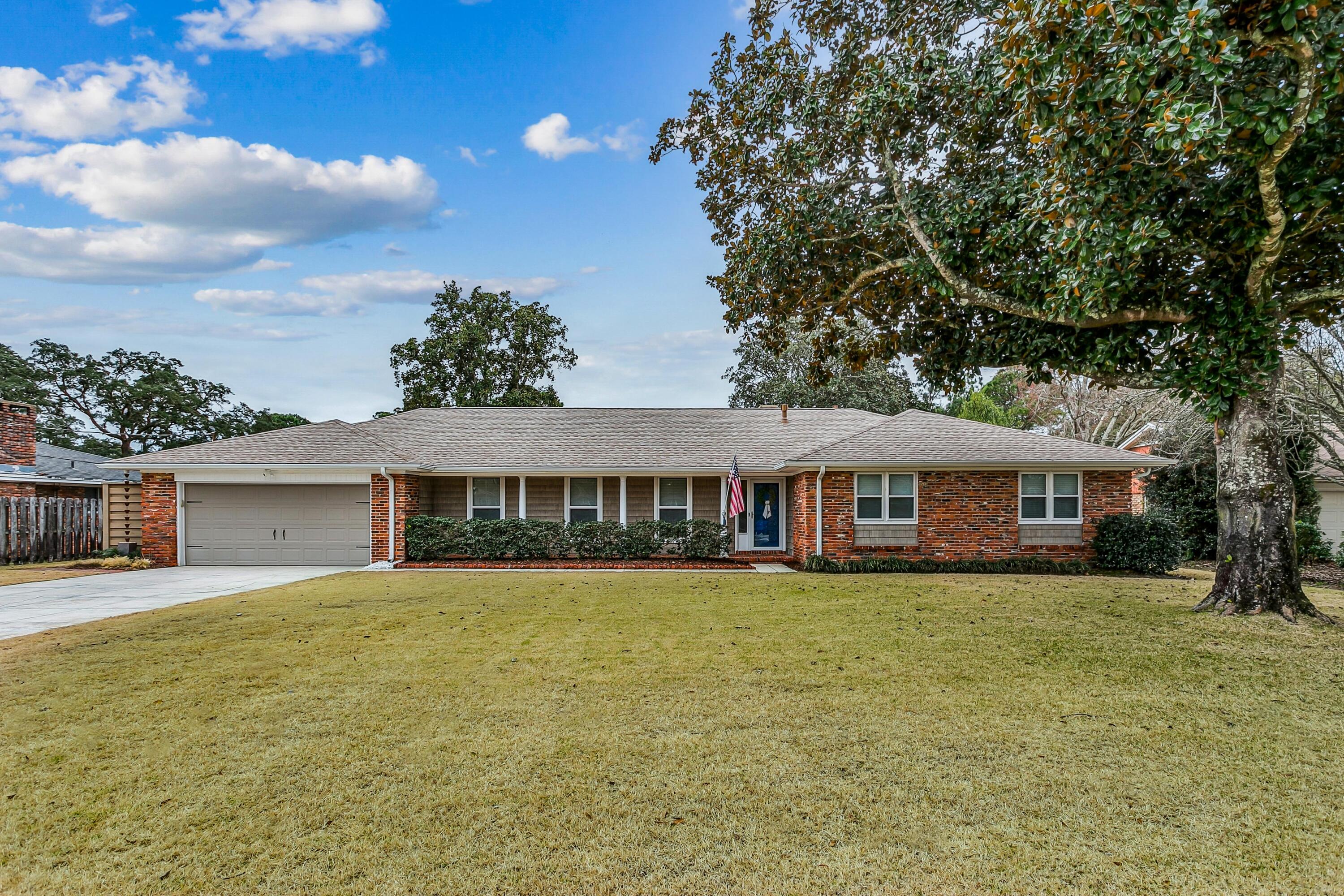 76 Country Club Road Shalimar, FL 32579 - Photo 43 of 47 a view of a house with a yard