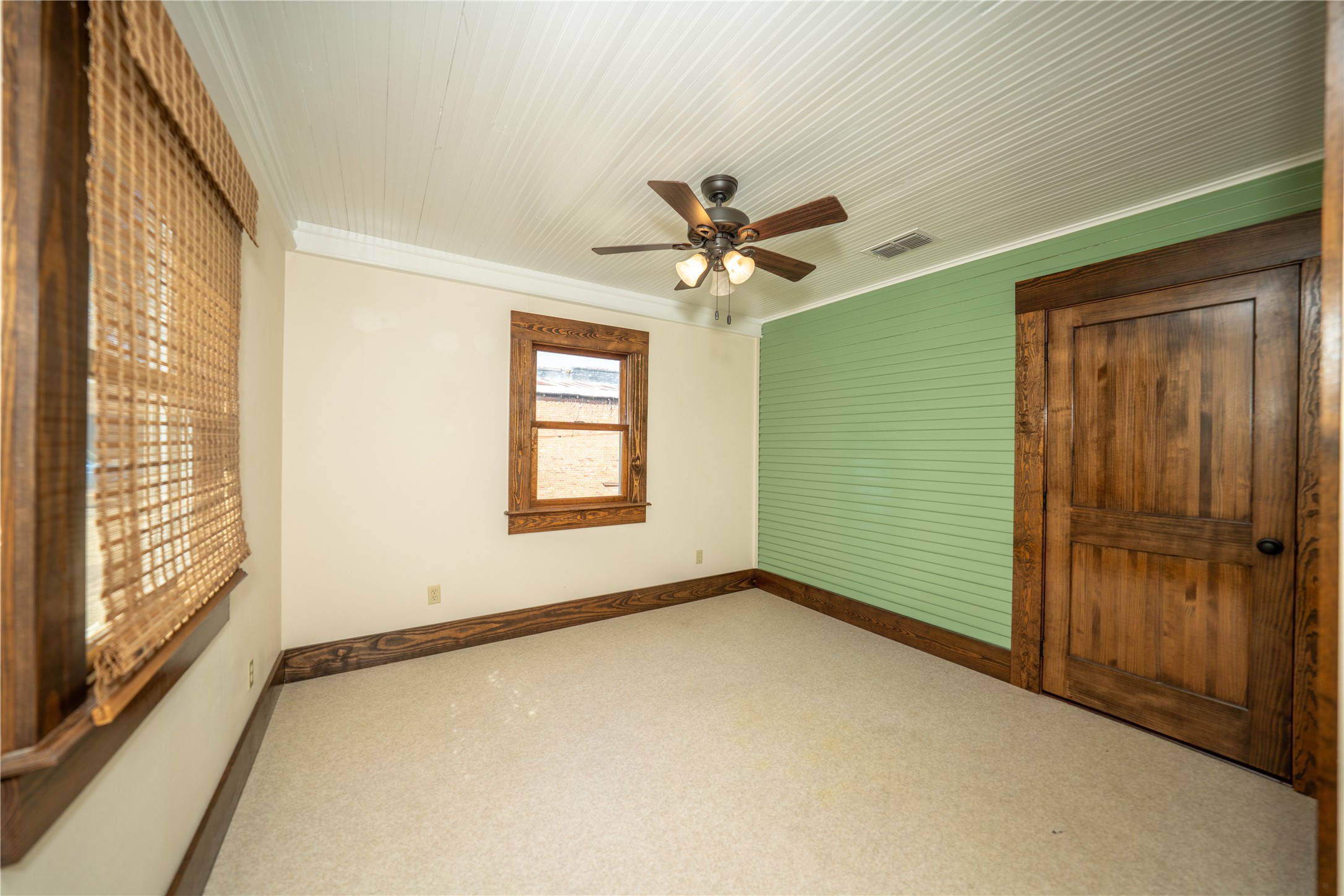 236 Main Street Grapeland, TX 75844 - Photo 15 of 31 a view of an empty room with a window