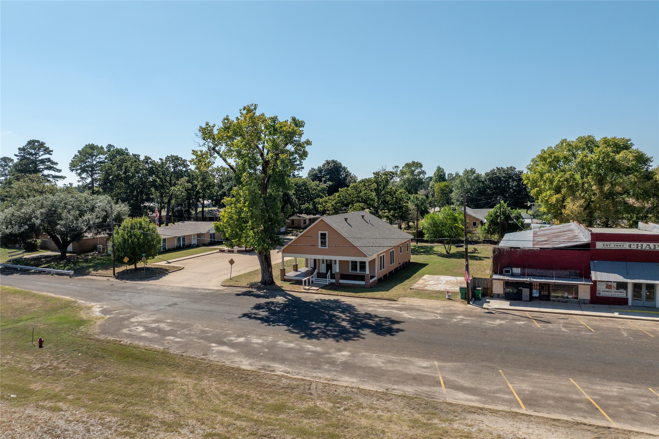 236 Main Street Grapeland, TX 75844 - Photo 22 of 31 a view of a house with a yard and sitting area