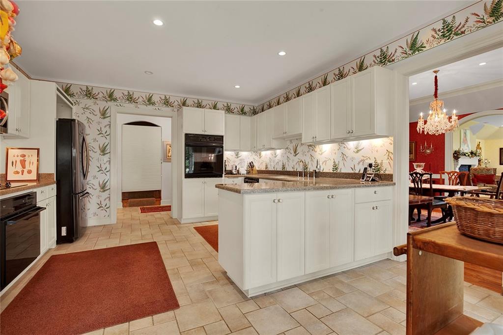274 Rector Road Rector, PA 15677 - Photo 23 of 50 a kitchen with refrigerator and cabinets