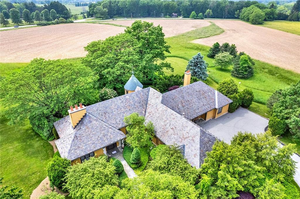 274 Rector Road Rector, PA 15677 - Photo 6 of 50 an aerial view of a house with garden space and a street view