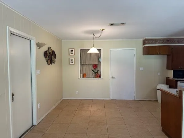 a view of a hallway with closet