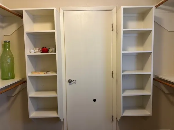 a view of a room with windows