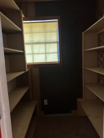 a view of a refrigerator in kitchen and a refrigerator