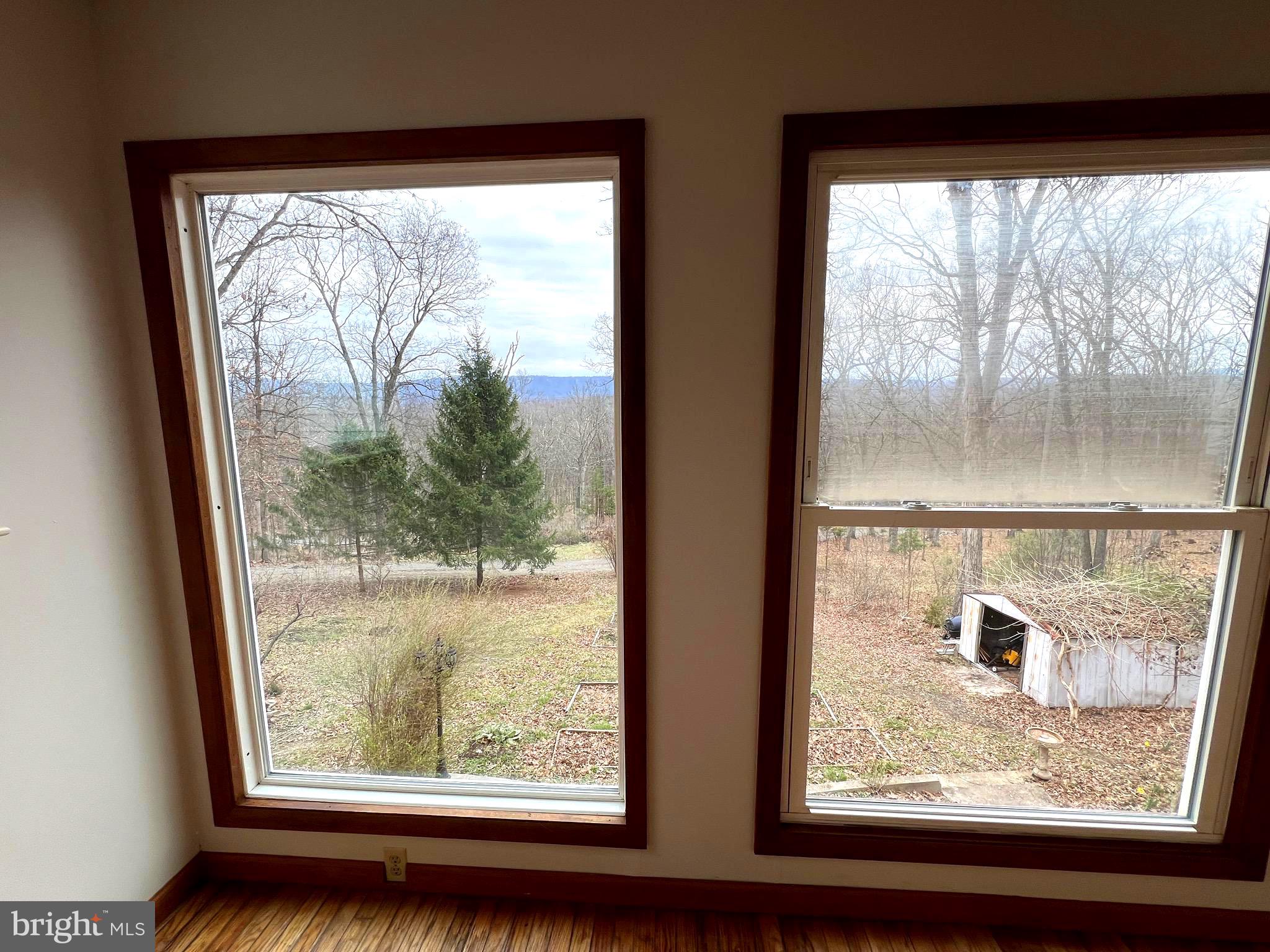 2932 Kerns School Road Springfield, WV 26763 - Photo 13 of 52 a view of a room with a large window and front door