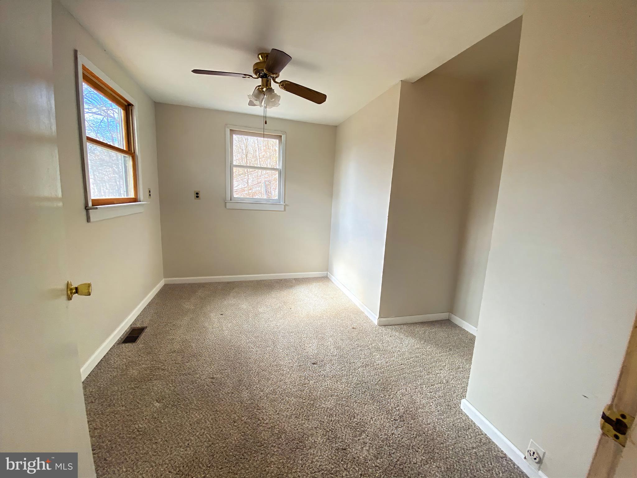 2932 Kerns School Road Springfield, WV 26763 - Photo 17 of 52 a view of empty room with windows