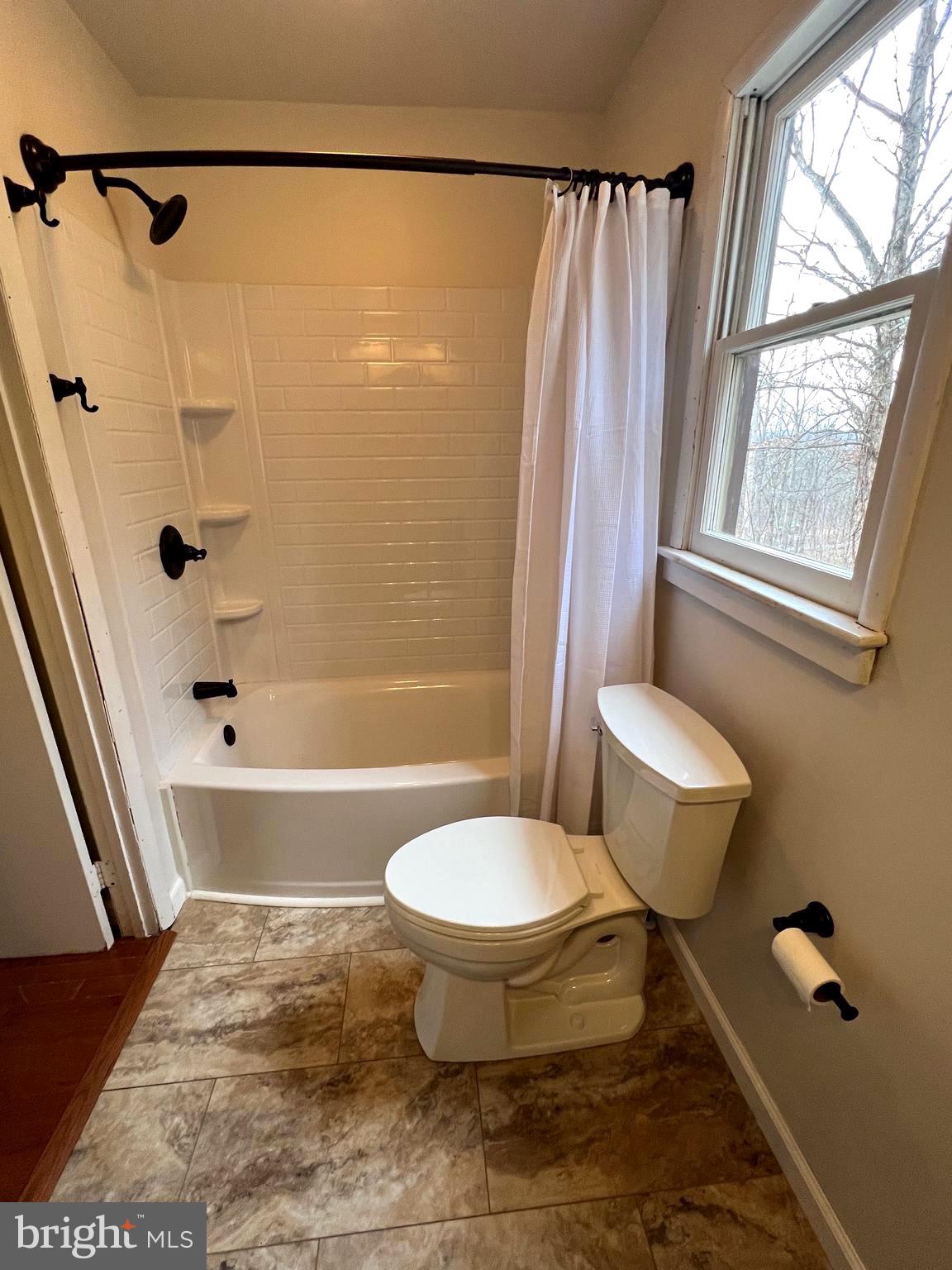 2932 Kerns School Road Springfield, WV 26763 - Photo 19 of 52 a bathroom with a toilet and a shower