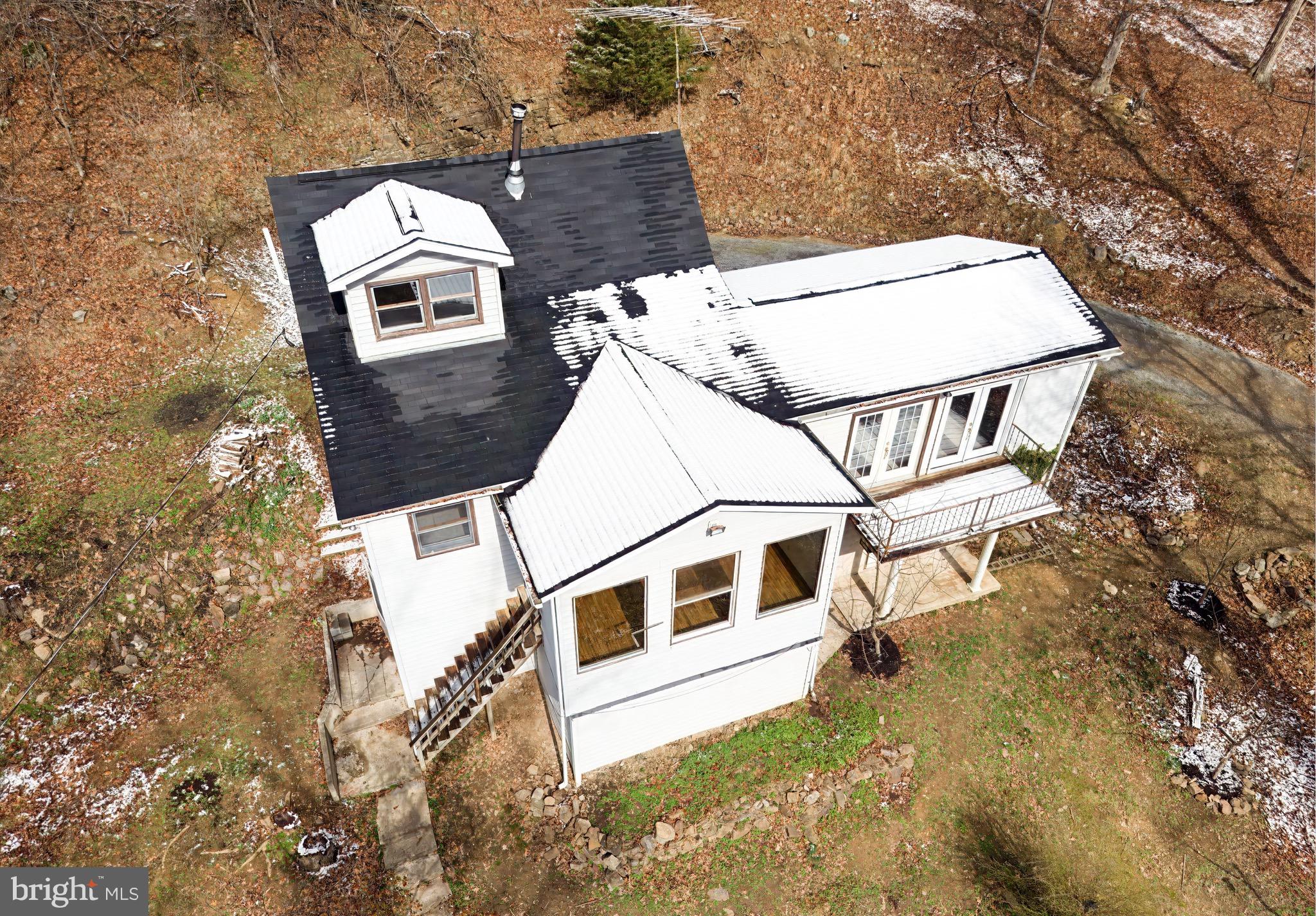 2932 Kerns School Road Springfield, WV 26763 - Photo 3 of 52 a view of a house with a yard