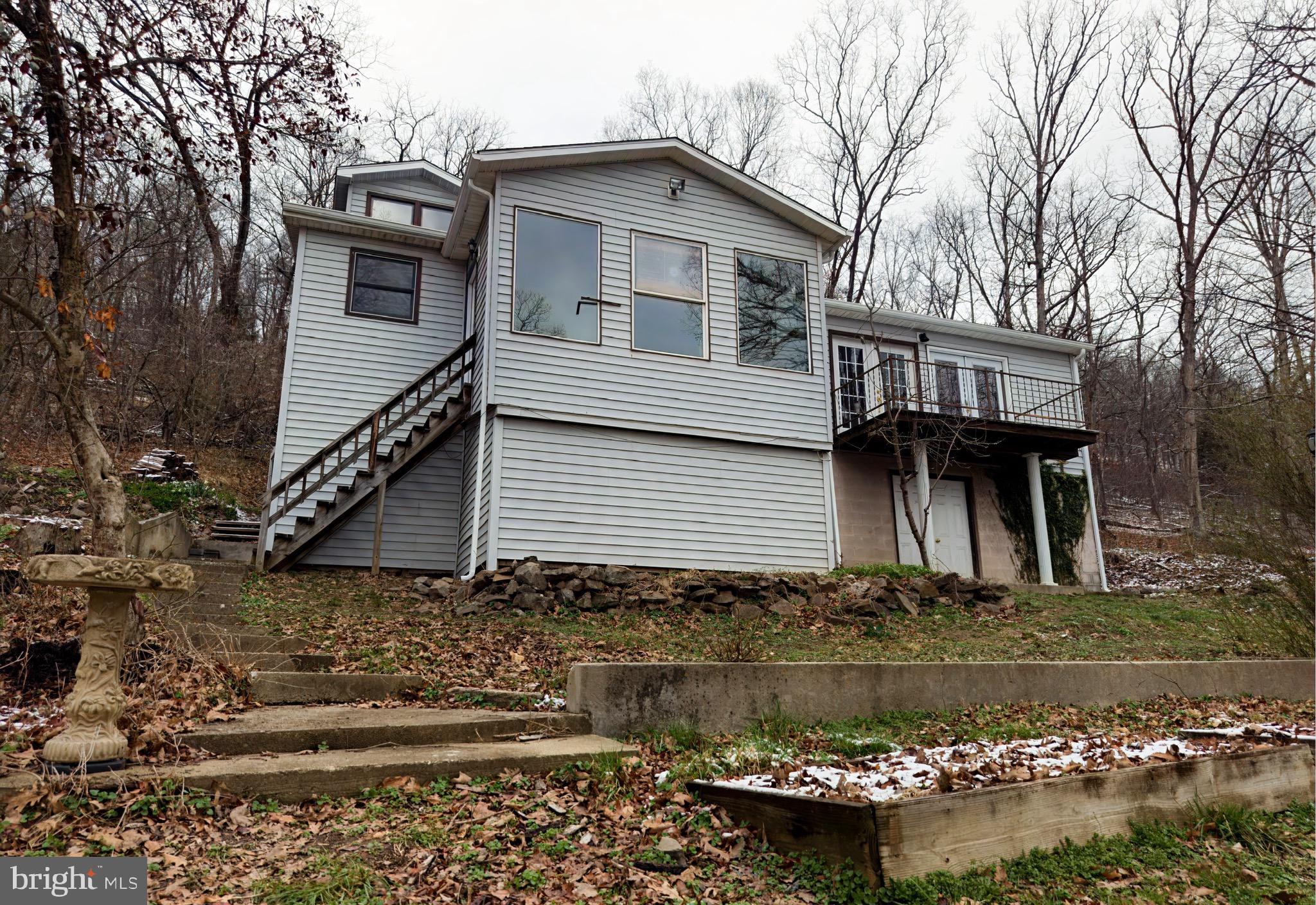 2932 Kerns School Road Springfield, WV 26763 - Photo 41 of 52 a front view of a house with a yard