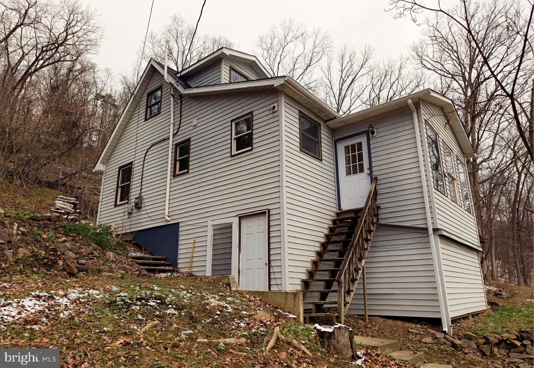 2932 Kerns School Road Springfield, WV 26763 - Photo 42 of 52 a view of a house with a yard