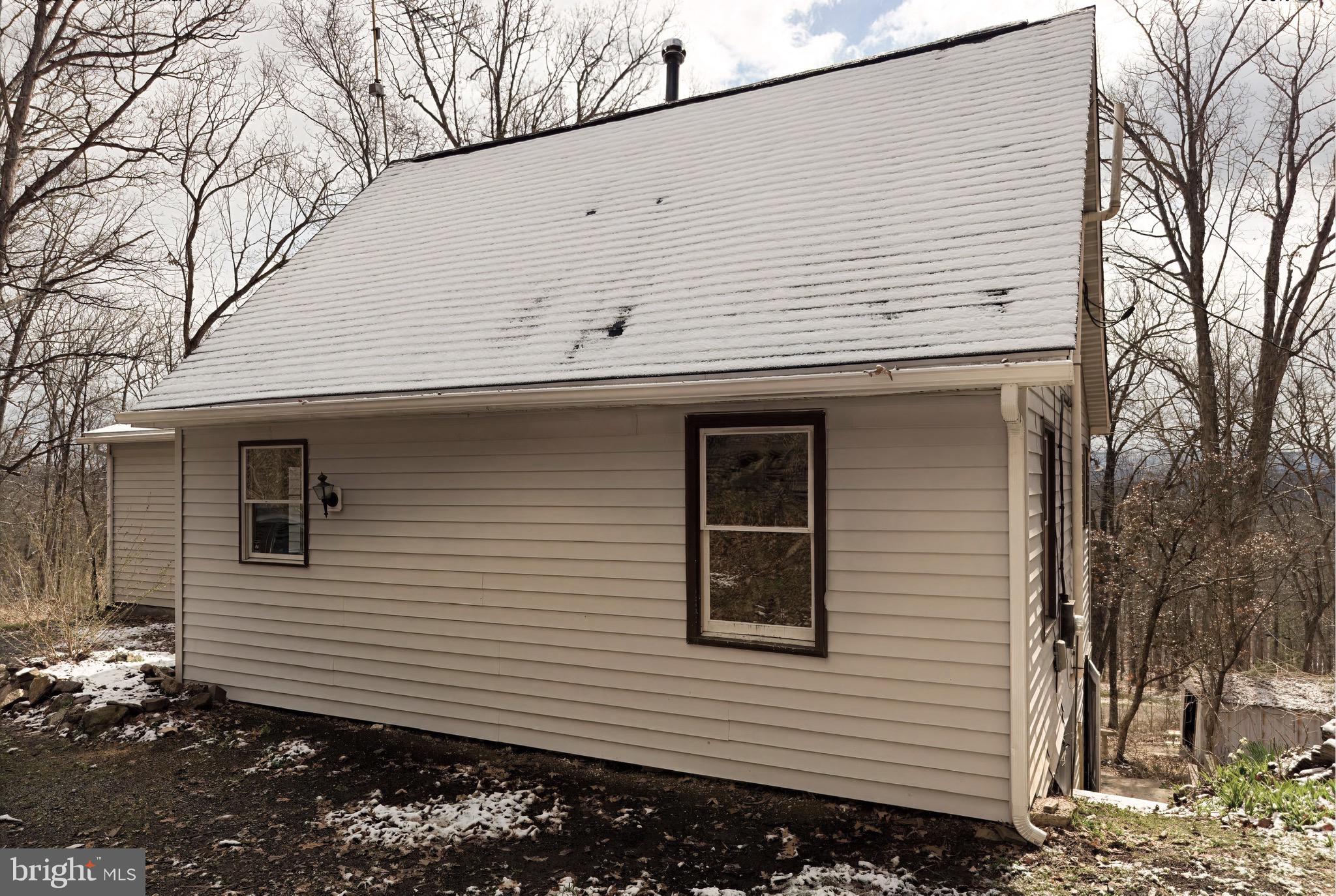 2932 Kerns School Road Springfield, WV 26763 - Photo 45 of 52 a view of a house with a yard