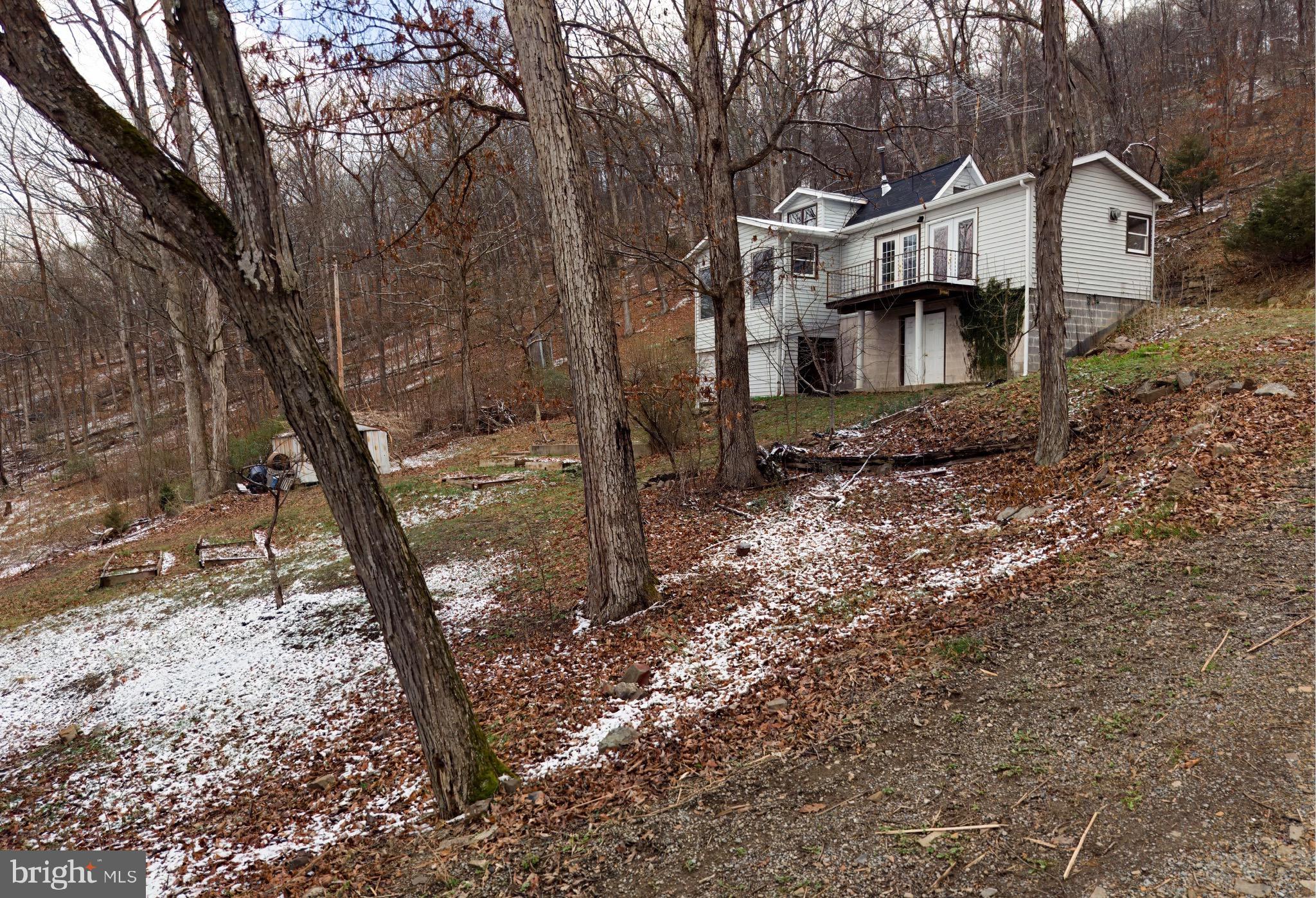 2932 Kerns School Road Springfield, WV 26763 - Photo 47 of 52 a front view of a house with a yard