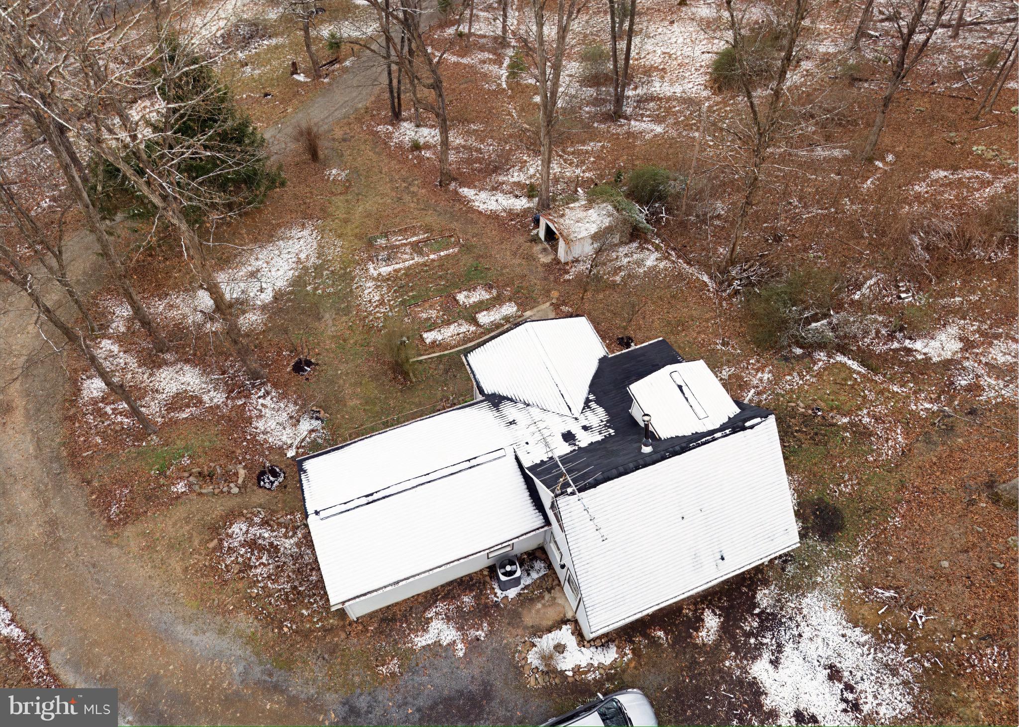 2932 Kerns School Road Springfield, WV 26763 - Photo 48 of 52 a view of a fireplace in a yard