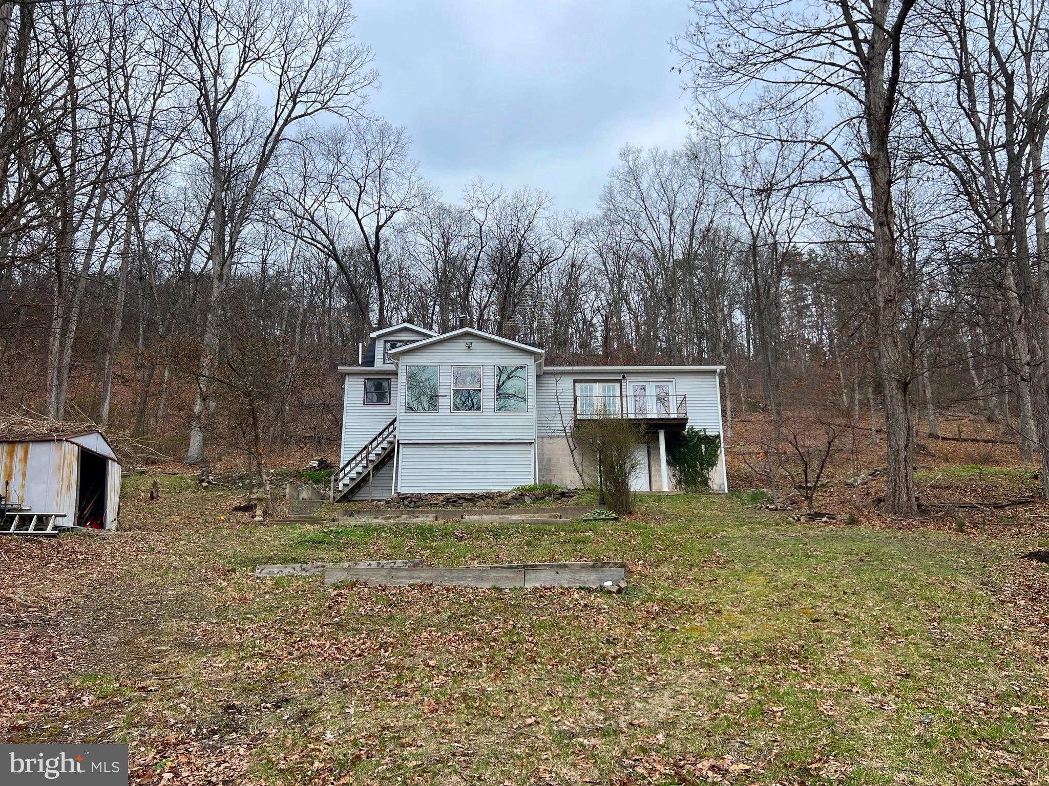 2932 Kerns School Road Springfield, WV 26763 - Photo 52 of 52 a view of a tiny house with a yard