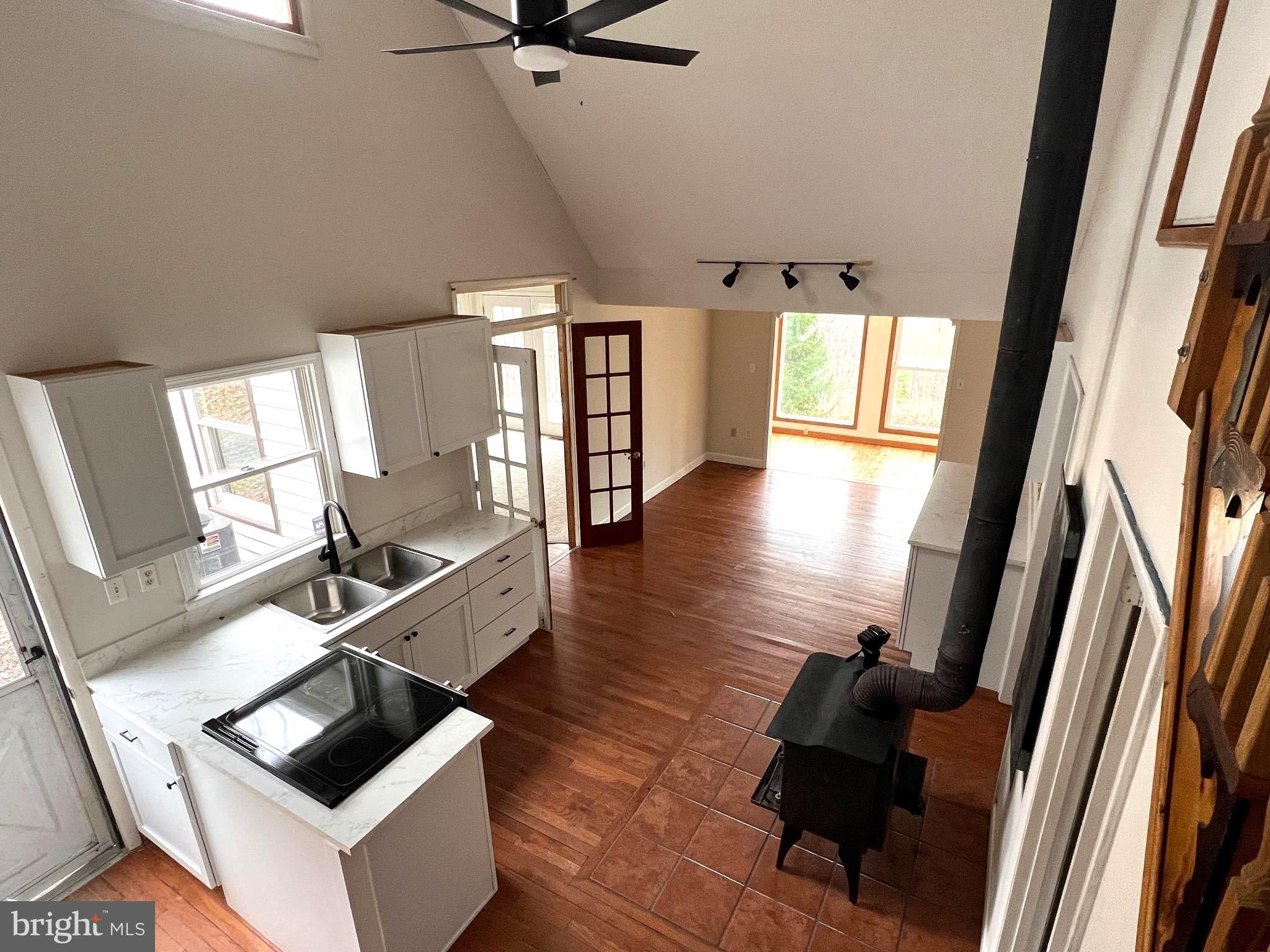 2932 Kerns School Road Springfield, WV 26763 - Photo 6 of 52 a view of living room with wooden floor and window