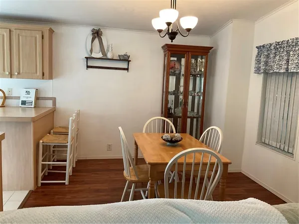a view of a dining room with furniture